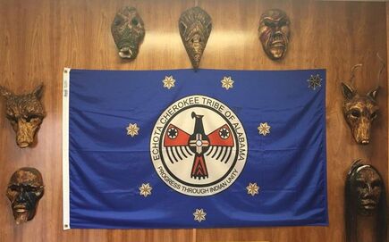 Echota Cherokee Flag hanging on the office wall.